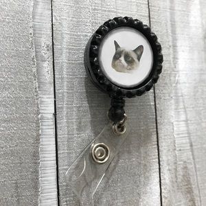 Grumpy cat badge reel